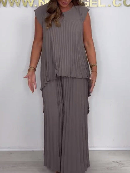 💖ULTIMO GIORNO DI SCONTO DEL 50%💖Completo composto da top midi irregolare a maniche corte plissettato e pantaloni a gamba larga con elastico in vita di Laney✨