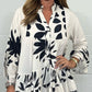V-Neck Floral Flared Sleeve Ruffle Hem Top